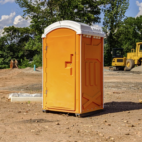 how often are the porta potties cleaned and serviced during a rental period in Spillville